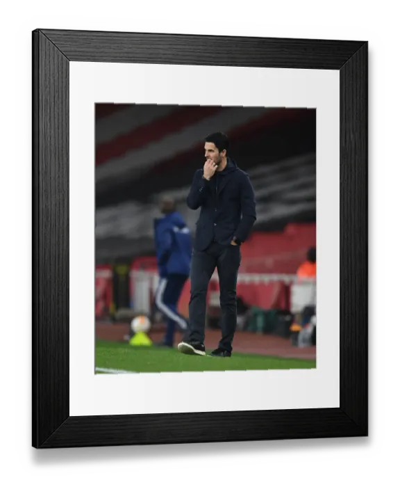 Framed Print : Arsenal's Mikel Arteta Leads Team in Empty Emirates Stadium Against Olympiacos, UEFA Europa League Round of 16 Framed Print : Arsenal's Mikel Arteta Leads Team in Empty Emirates Stadium Against Olympiacos, UEFA Europa League Round of 16