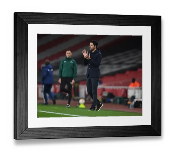 Framed Print : Mikel Arteta Leads Empty Emirates Stadium: Arsenal vs. Olympiacos in Europa League Amid Coronavirus Restrictions Framed Print : Mikel Arteta Leads Empty Emirates Stadium: Arsenal vs. Olympiacos in Europa League Amid Coronavirus Restrictions