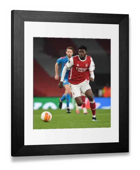 Framed Print : Arsenal's Thomas Partey in Europa League Clash Against Olympiacos (Behind Closed Doors)