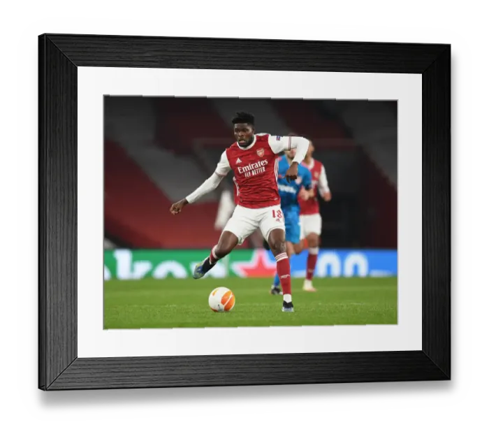 Framed Print : Thomas Partey Leads Arsenal in Europa League Match against Olympiacos (Behind Closed Doors), 2021