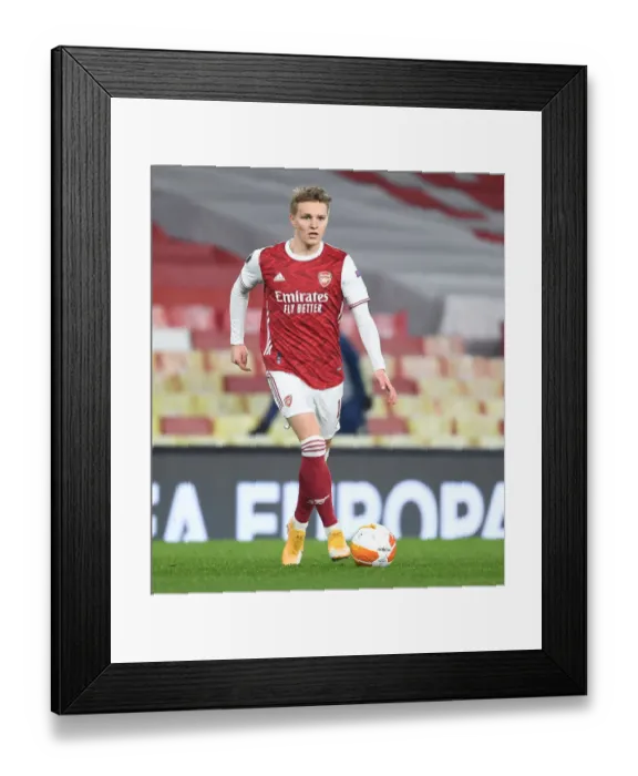 Framed Print : Arsenal's Martin Odegaard in Europa League Action Against Olympiacos at Empty Emirates Stadium