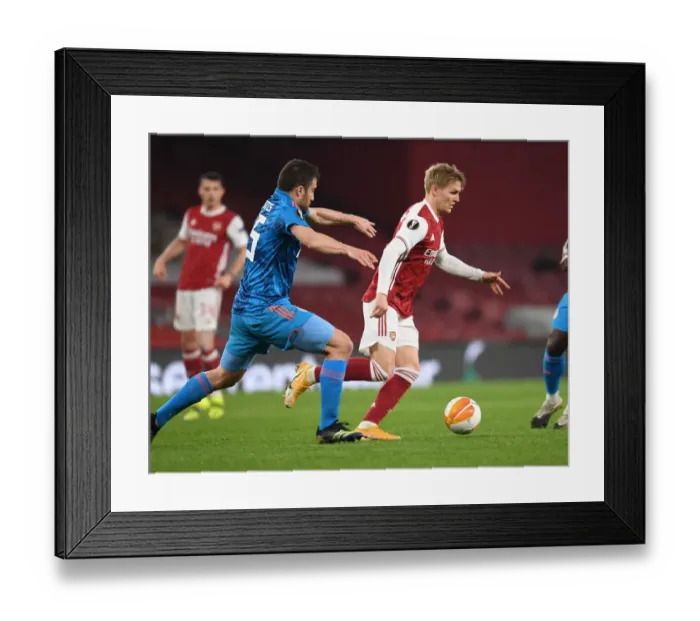 Framed Print : Arsenal vs. Olympiacos: Martin Odegaard Clashes with Sokratis in Empty Europa League Match, London, 2021