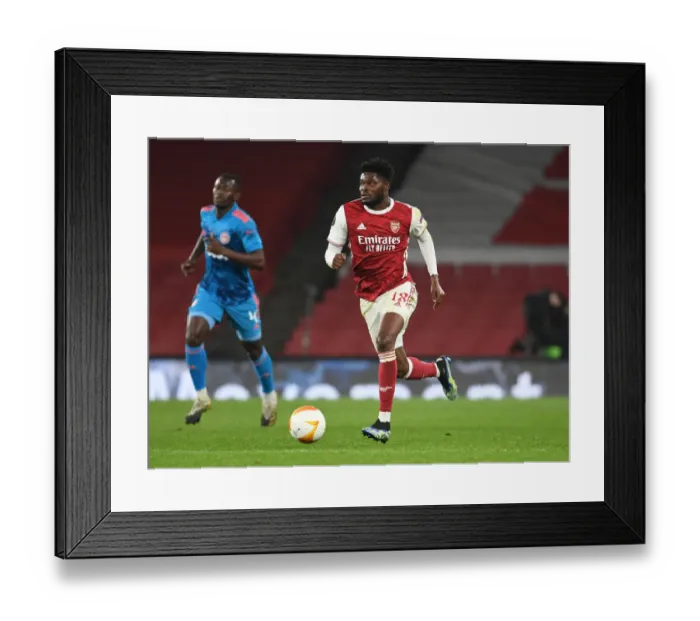 Framed Print : Thomas Partey in Action: Arsenal vs. Olympiacos - Europa League, London 2021 (Behind Closed Doors)