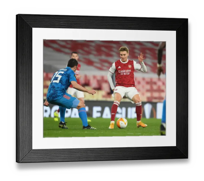 Framed Print : Clash of the Titans: Odegaard vs Sokratis - Arsenal vs Olympiacos, Emirates Stadium, UEFA Europa League 2021 (Behind Closed Doors)