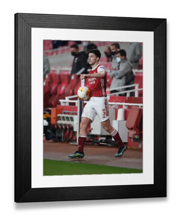 Framed Print : Arsenal's Kieran Tierney in Europa League Action: Arsenal vs. Olympiacos (Behind Closed Doors)
