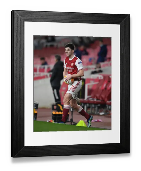 Framed Print : Arsenal's Kieran Tierney in Europa League Action: Arsenal vs. Olympiacos (Behind Closed Doors)