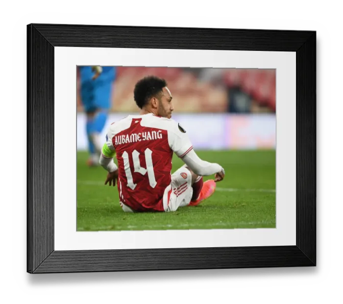 Framed Print : Arsenal's Aubameyang Fights for Europa League Victory Amidst Emirates Stadium's Empty Seats: Arsenal vs. Olympiacos Amidst Pandemic Restrictions Framed Print : Arsenal's Aubameyang Fights for Europa League Victory Amidst Emirates Stadium's Empty Seats: Arsenal vs. Olympiacos Amidst Pandemic Restrictions