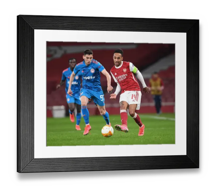 Framed Print : Arsenal's Aubameyang Scores in Empty Emirates Against Olympiacos - UEFA Europa League Round of 16