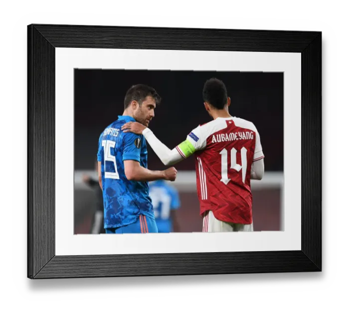 Framed Print : Arsenal vs Olympiacos: Aubameyang and Sokratis Face Off in Empty Emirates Stadium - UEFA Europa League 2020-21