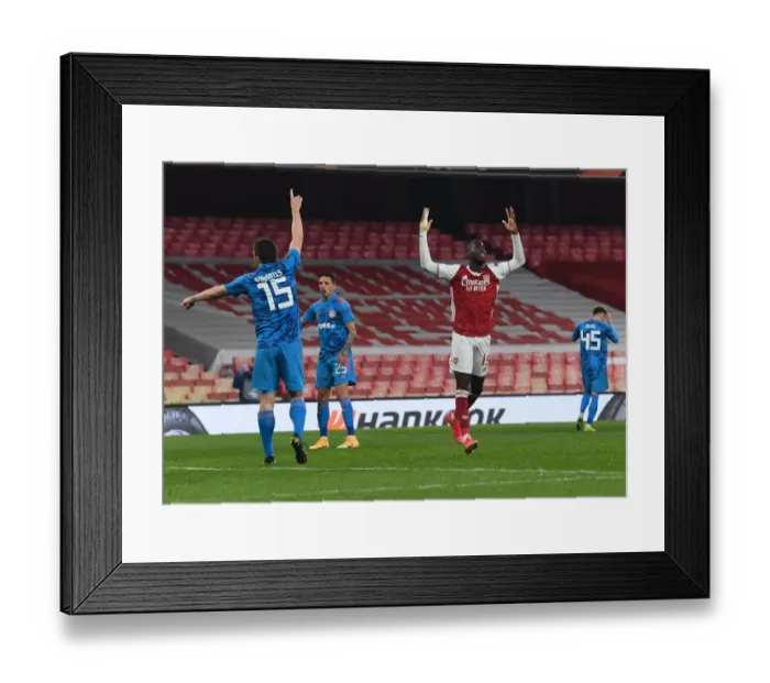 Framed Print : Lone Warrior: Pepe's Europa League Battle in Empty Emirates Stadium Framed Print : Lone Warrior: Pepe's Europa League Battle in Empty Emirates Stadium