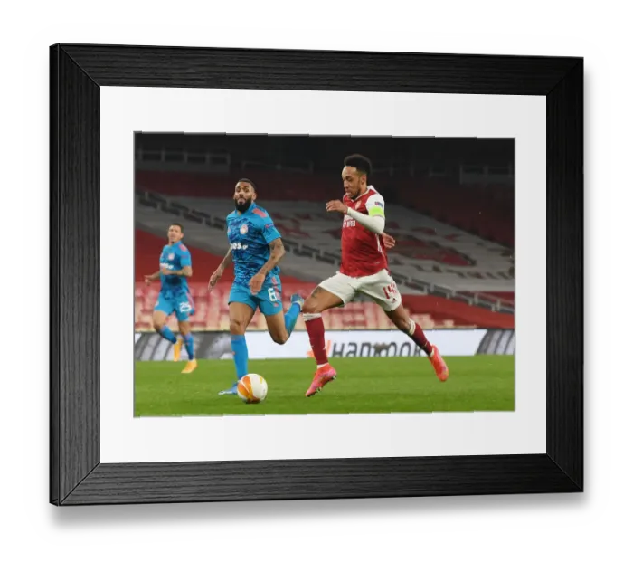 Framed Print : Arsenal's Aubameyang in Europa League Action: Emirates Stadium Showdown vs. Olympiacos Amidst Empty Seats (2020-21) Framed Print : Arsenal's Aubameyang in Europa League Action: Emirates Stadium Showdown vs. Olympiacos Amidst Empty Seats (2020-21)