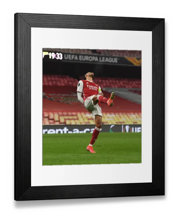 Framed Print : Arsenal's Aubameyang Expresses Frustration in Empty Emirates During Europa League Match vs. Olympiacos
