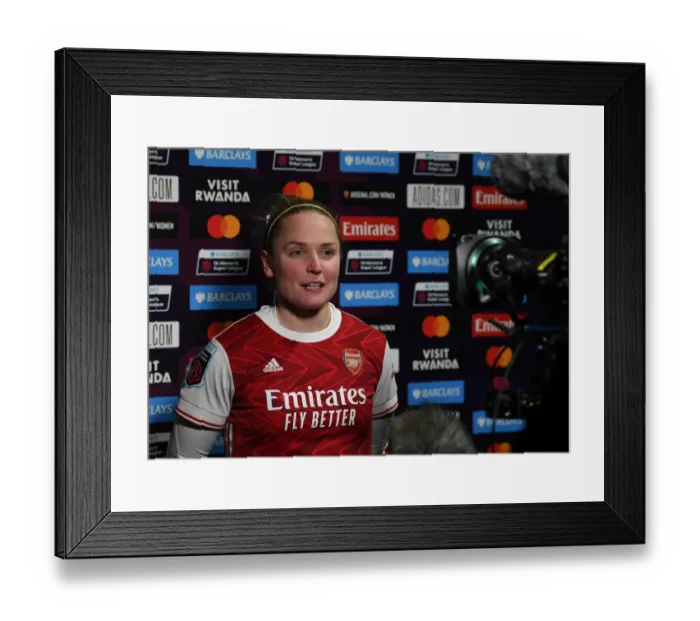Framed Print : Arsenal's Kim Little Ponders Manchester United Match Amidst Empty FA WSL Stands (2021)