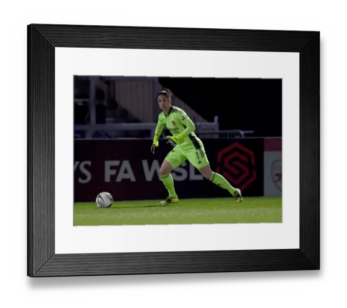 Framed Print : Empty Meadow Park: Arsenal Women vs Manchester United Women Clash in FA WSL Amidst Coronavirus Restrictions (March 19, 2021)