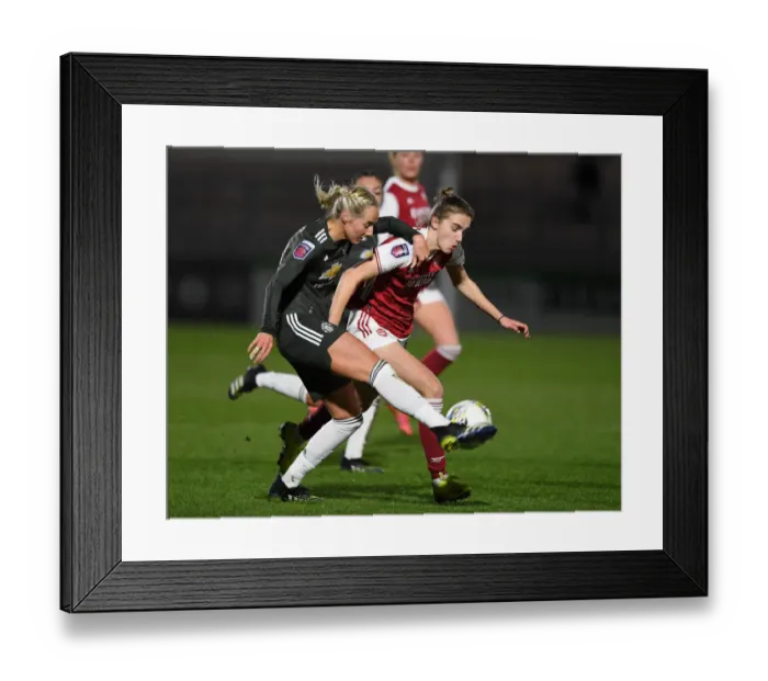 Framed Print : FA WSL Showdown: Miedema vs Turner - Arsenal vs Manchester United in Empty Stands Amidst Coronavirus Pandemic