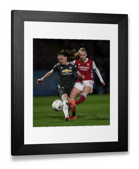 Framed Print : FA WSL Showdown: Beth Mead vs Ona Batlle - Arsenal Women vs Manchester United Women in Empty Stands