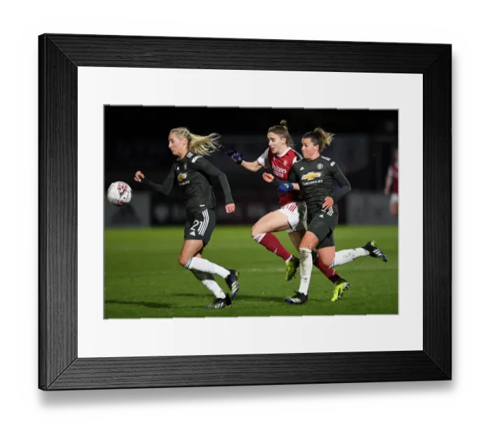 Framed Print : Riveting Rivalry: Arsenal Women vs Manchester United Women at Empty Meadow Park Amidst Pandemic Restrictions