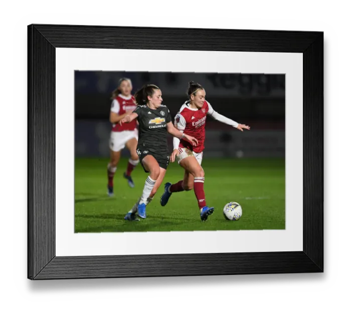 Framed Print : Arsenal Women vs Manchester United Women: FA WSL Clash in Empty Stands (2020-21)