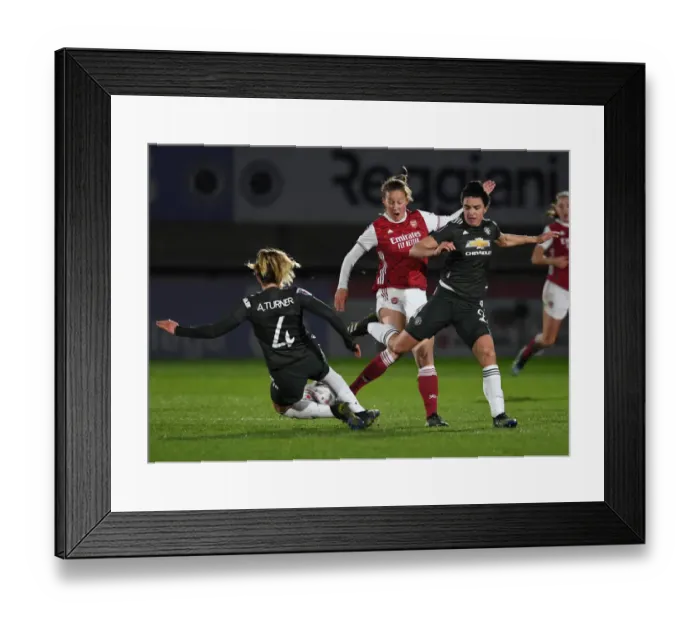 Framed Print : Arsenal Women vs Manchester United Women: Malin Gut Clashes with Amy Turner and Jess Sigsworth in Empty Meadow Park Framed Print : Arsenal Women vs Manchester United Women: Malin Gut Clashes with Amy Turner and Jess Sigsworth in Empty Meadow Park