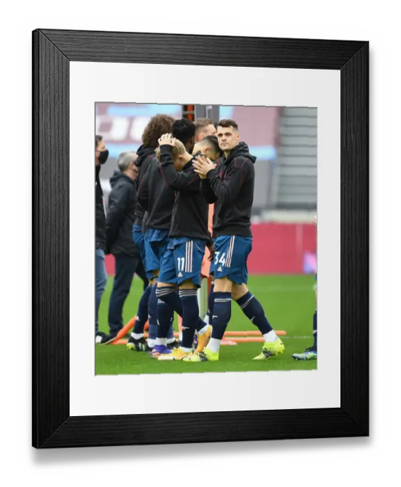 Framed Print : Granit Xhaka: Arsenal Star Prepares for West Ham Clash Amidst Empty London Stadium (Premier League 2020-21)