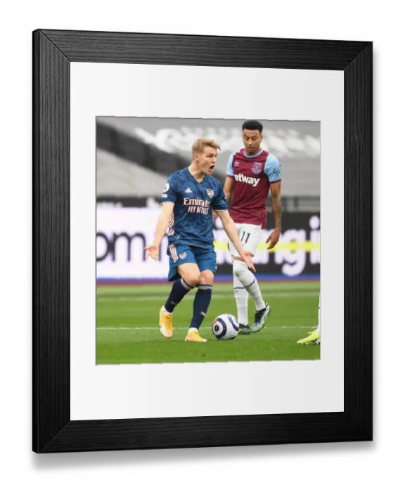 Framed Print : Arsenal's Martin Odegaard at Empty London Stadium: West Ham United vs Arsenal, Premier League 2021