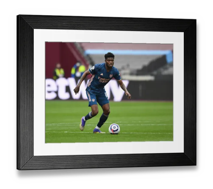 Framed Print : Thomas Partey in Action: Arsenal vs. West Ham United - Premier League 2021 (Behind Closed Doors)