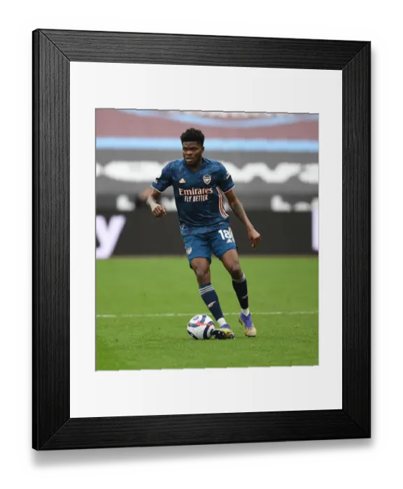 Framed Print : Thomas Partey in Action: Arsenal vs. West Ham United - Premier League 2021 (Behind Closed Doors)