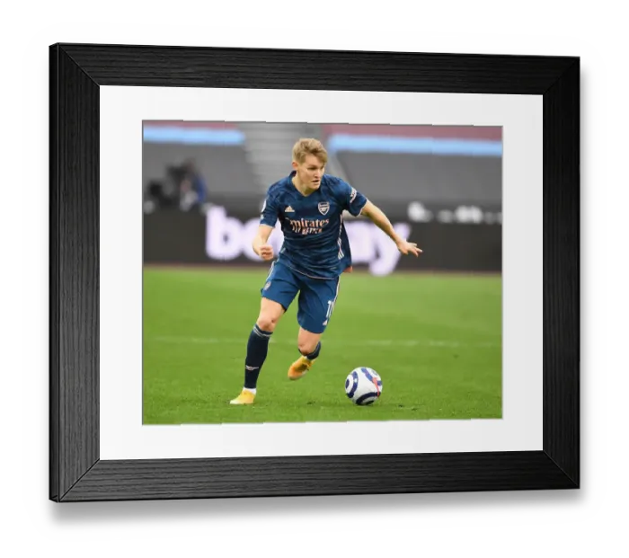 Framed Print : Behind Closed Doors: Martin Odegaard Plays On at Empty West Ham Stadium - Arsenal vs. West Ham United, Premier League 2021 Framed Print : Behind Closed Doors: Martin Odegaard Plays On at Empty West Ham Stadium - Arsenal vs. West Ham United, Premier League 2021