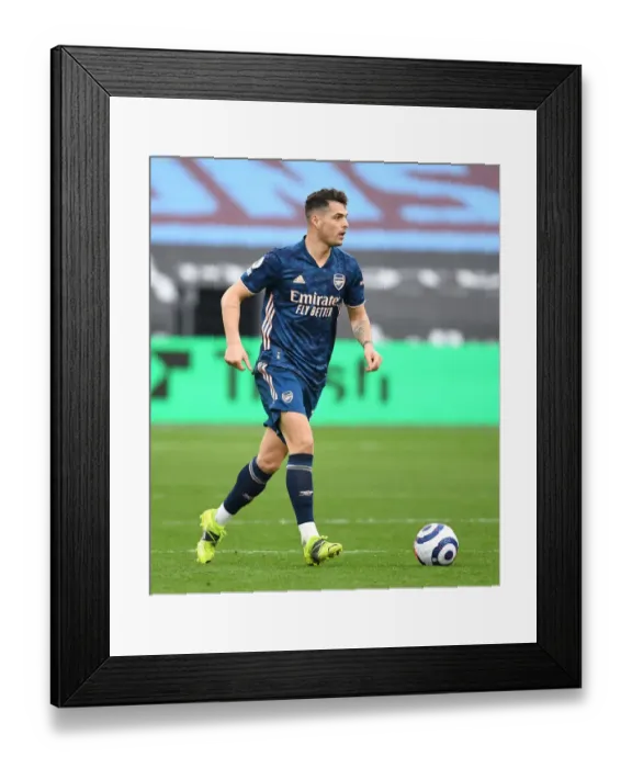 Framed Print : Granit Xhaka: Arsenal's Midfield Mastermind Shines in Empty Premier League Arena vs. West Ham United (2020-21) Framed Print : Granit Xhaka: Arsenal's Midfield Mastermind Shines in Empty Premier League Arena vs. West Ham United (2020-21)
