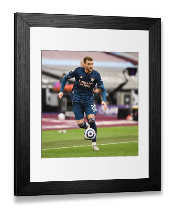 Framed Print : Arsenal's Calum Chambers at Empty West Ham Stadium: 2020-21 Premier League Match Amidst COVID-19 Restrictions Framed Print : Arsenal's Calum Chambers at Empty West Ham Stadium: 2020-21 Premier League Match Amidst COVID-19 Restrictions