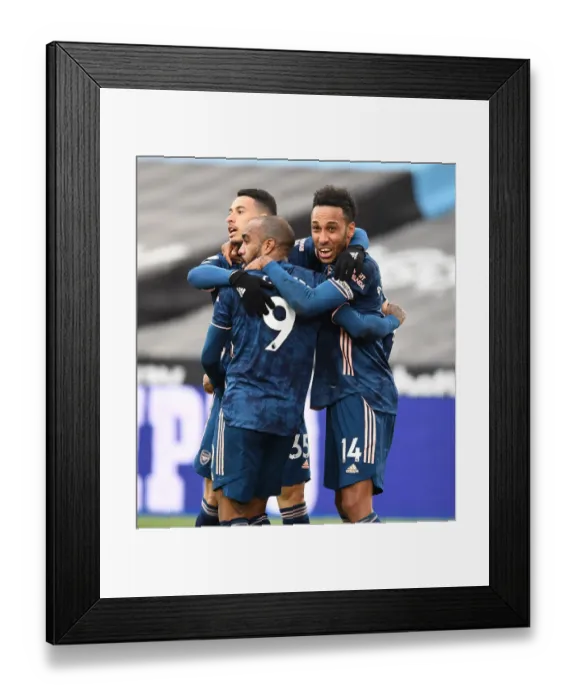 Framed Print : Empty Net Triumph: Lacazette, Martinelli, Aubameyang's Goal Celebration at London Stadium