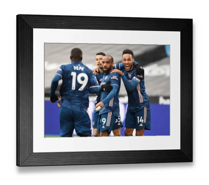 Framed Print : Arsenal's Lacazette, Pepe, Martinelli, and Aubameyang Celebrate Goals Against West Ham in Empty London Stadium Framed Print : Arsenal's Lacazette, Pepe, Martinelli, and Aubameyang Celebrate Goals Against West Ham in Empty London Stadium