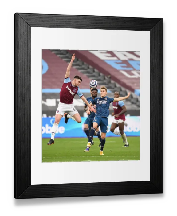 Framed Print : Arsenal vs. West Ham United: Premier League Clash Amidst Empty London Stadium (March 2021) Framed Print : Arsenal vs. West Ham United: Premier League Clash Amidst Empty London Stadium (March 2021)