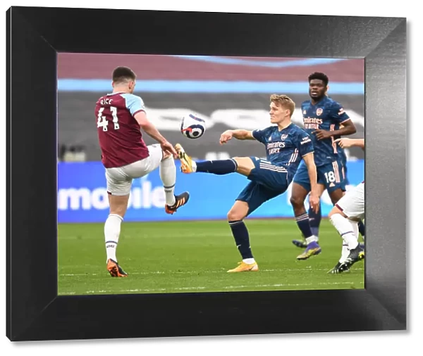 Martin Odegaard vs. Declan Rice: A Battle in Empty London Stadium - Arsenal vs. West Ham United, Premier League 2021
