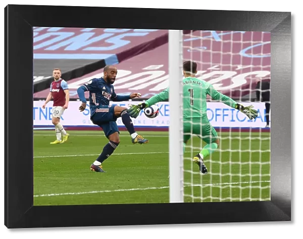 Dramatic Moment: Lacazette's Chipped Shot Cleared Off the Line in West Ham vs Arsenal Premier League Clash (Behind Closed Doors)