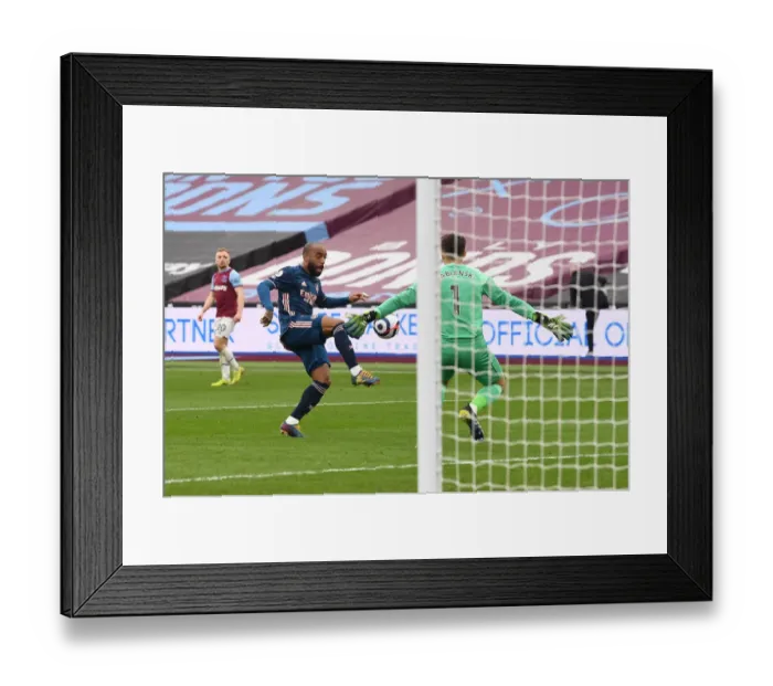 Framed Print : Dramatic Moment: Lacazette's Chipped Shot Cleared Off the Line in West Ham vs Arsenal Premier League Clash (Behind Closed Doors) Framed Print : Dramatic Moment: Lacazette's Chipped Shot Cleared Off the Line in West Ham vs Arsenal Premier League Clash (Behind Closed Doors)