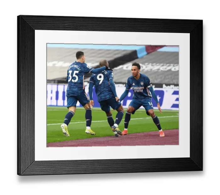 Framed Print : Empty Net Triumph: Lacazette, Martinelli, Aubameyang's Goal Celebration at London Stadium