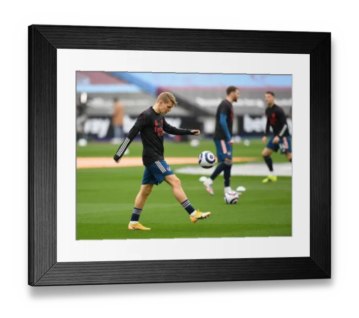 Framed Print : Arsenal's Martin Odegaard Gears Up for West Ham Clash in Premier League Framed Print : Arsenal's Martin Odegaard Gears Up for West Ham Clash in Premier League