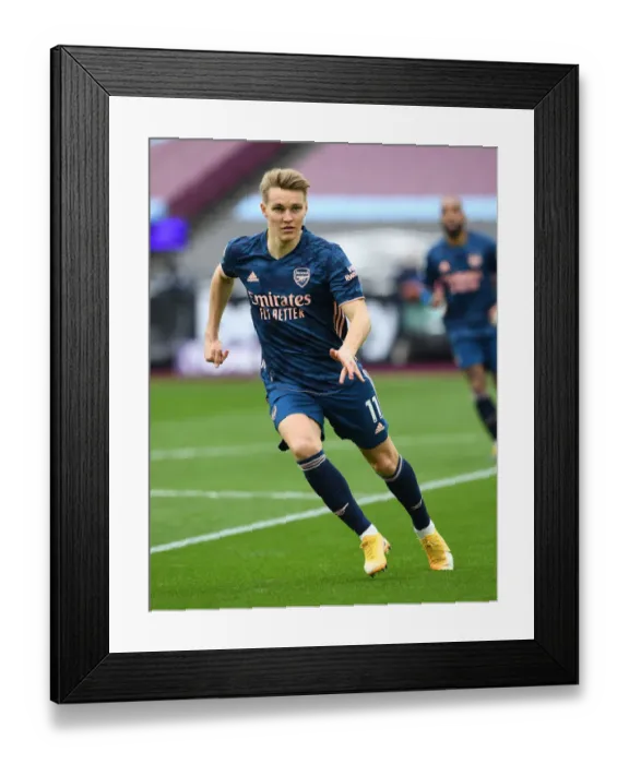 Framed Print : Martin Odegaard in Action: Arsenal vs West Ham United, Premier League 2020-21 Framed Print : Martin Odegaard in Action: Arsenal vs West Ham United, Premier League 2020-21