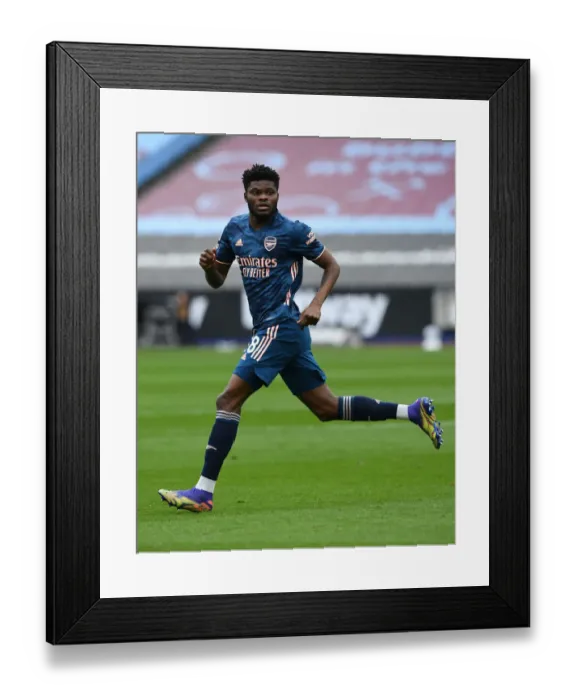 Framed Print : Thomas Partey in Action: Arsenal vs West Ham United, Premier League 2020-21 Framed Print : Thomas Partey in Action: Arsenal vs West Ham United, Premier League 2020-21