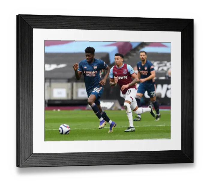 Framed Print : Thomas Partey vs. Jesse Lingard: Battle in the Premier League - West Ham United vs. Arsenal