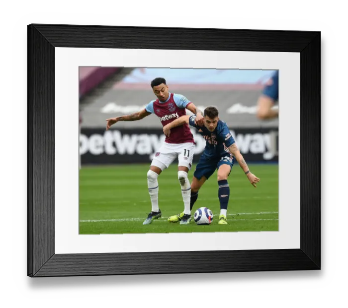 Framed Print : Xhaka vs Lingard: Intense Battle in West Ham United vs Arsenal Premier League Clash Framed Print : Xhaka vs Lingard: Intense Battle in West Ham United vs Arsenal Premier League Clash