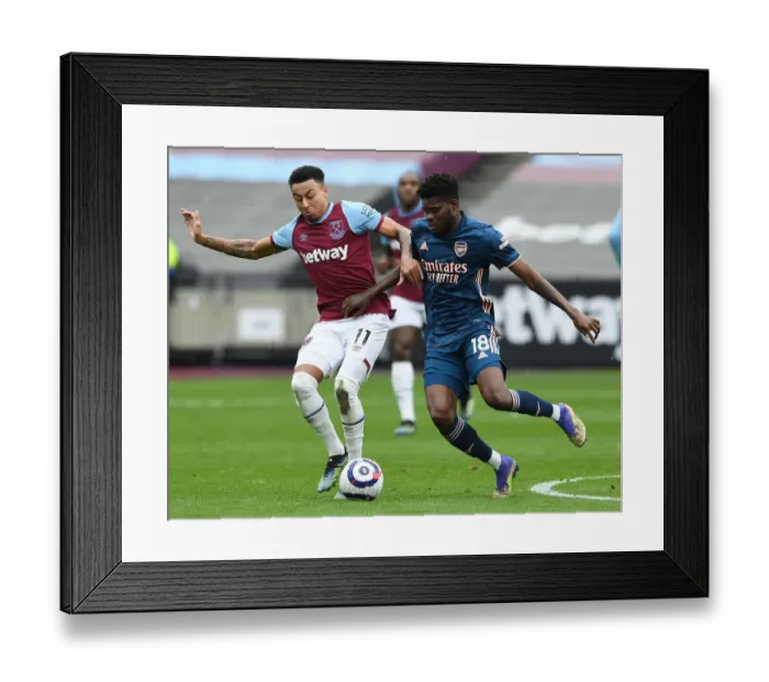 Framed Print : Thomas Partey vs Jesse Lingard: Battle in the Premier League - West Ham United vs Arsenal