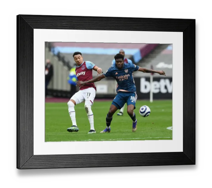 Framed Print : Partey vs. Lingard: A Premier League Battle at London Stadium Framed Print : Partey vs. Lingard: A Premier League Battle at London Stadium