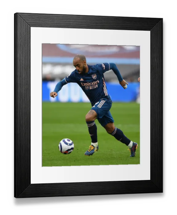Framed Print : Alexandre Lacazette in Action: West Ham United vs Arsenal, Premier League 2020-21 Framed Print : Alexandre Lacazette in Action: West Ham United vs Arsenal, Premier League 2020-21