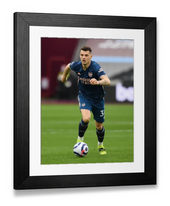 Framed Print : Granit Xhaka in Action: Arsenal vs. West Ham United, Premier League 2020-21 Framed Print : Granit Xhaka in Action: Arsenal vs. West Ham United, Premier League 2020-21