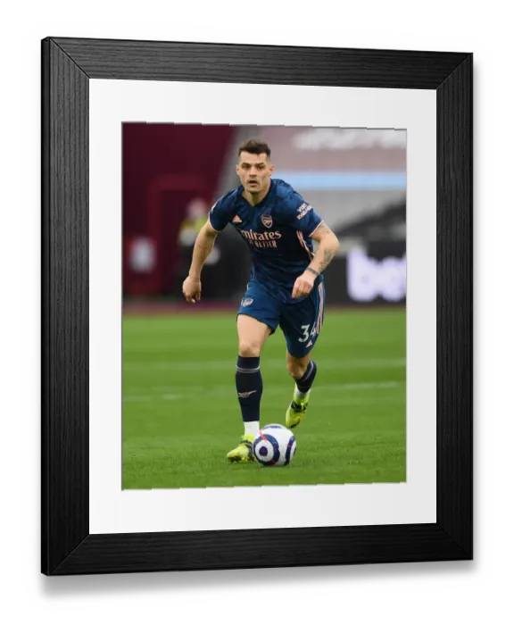 Framed Print : Granit Xhaka: Arsenal Midfielder in Action against West Ham United, Premier League 2020-21