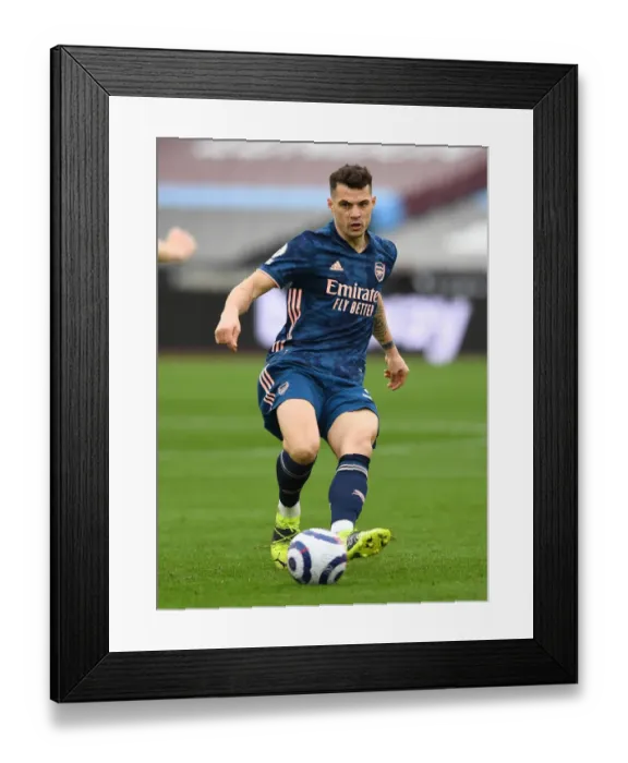 Framed Print : Granit Xhaka: Arsenal's Midfield Maestro in Action against West Ham United, Premier League 2020-21 Framed Print : Granit Xhaka: Arsenal's Midfield Maestro in Action against West Ham United, Premier League 2020-21