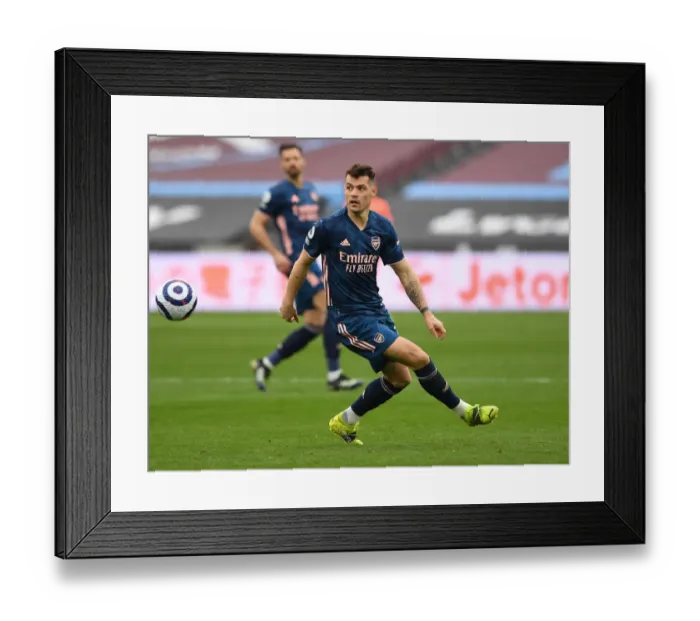Framed Print : Granit Xhaka in Action: West Ham United vs Arsenal, Premier League 2020-21 Framed Print : Granit Xhaka in Action: West Ham United vs Arsenal, Premier League 2020-21
