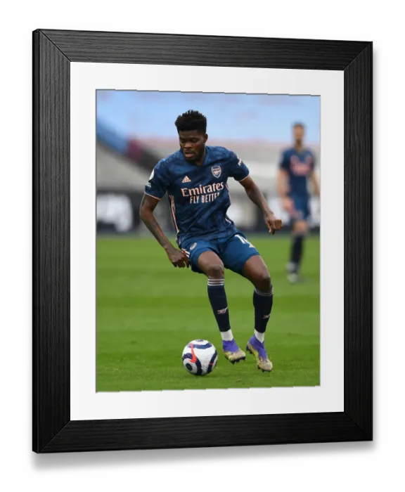 Framed Print : Thomas Partey in Action: Arsenal vs West Ham United, Premier League 2020-21 Framed Print : Thomas Partey in Action: Arsenal vs West Ham United, Premier League 2020-21